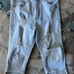 Distressed Light Blue Jeans
